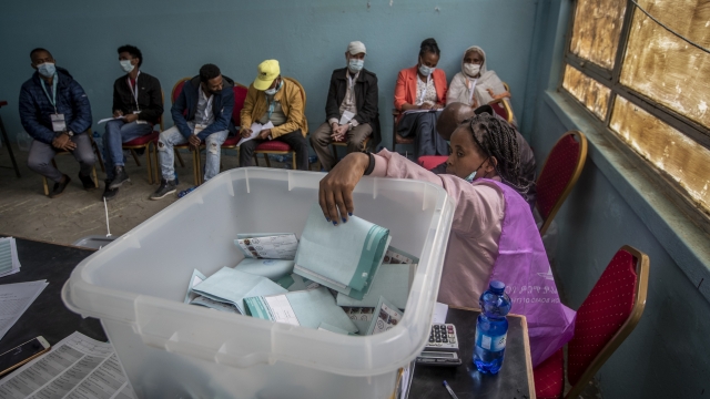 Electoral workers continue to count votes at a polling station in the capital Addis Ababa, Ethiopia.