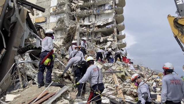 Rescue crews search for survivors in rubble