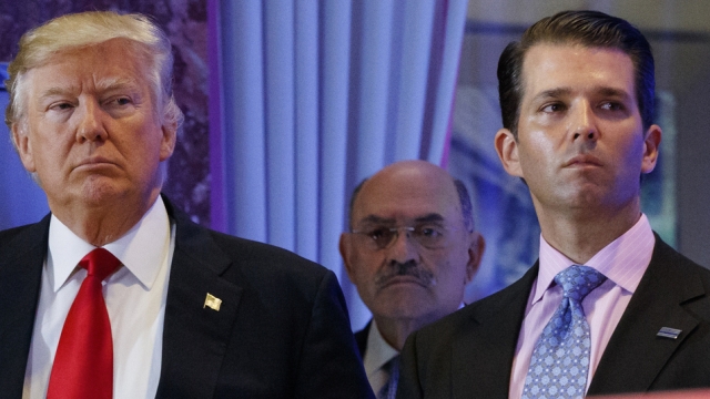 Donald Trump, left, his chief financial officer Allen Weisselberg, center, and Donald Trump Jr., right