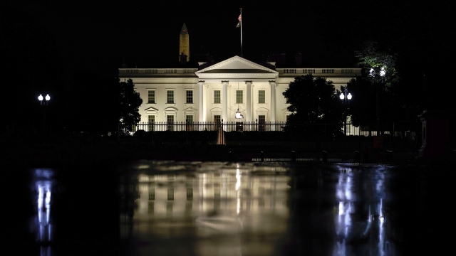 The White House is seen on a rainy night in Washington.