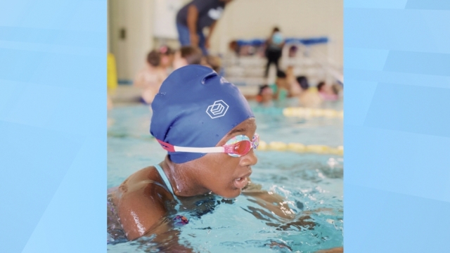 Swimmer wearing a Soul Cap