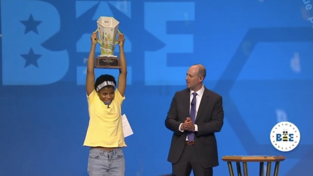 Girl Holds A Trophy