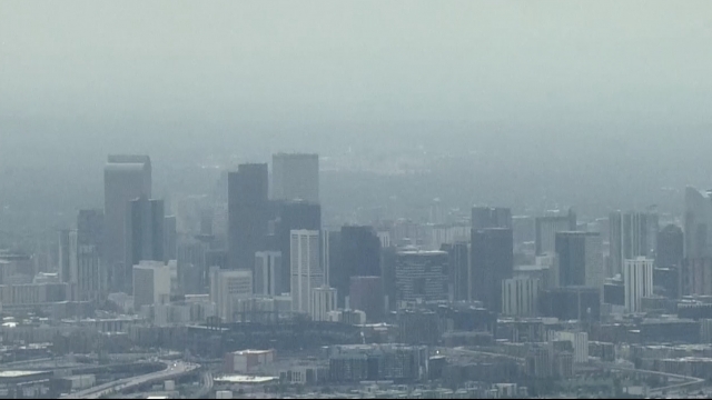 Haze sits on the Denver skyline