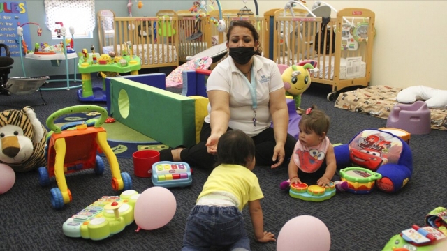 Teacher working with infants