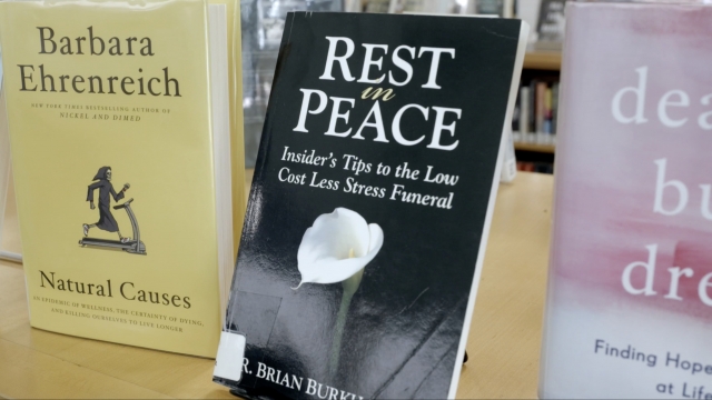 Books about death displayed at Alexandria Central Library
