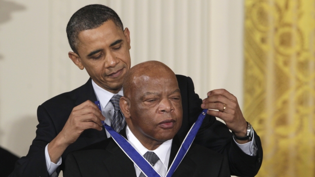 President Barack Obama presents a 2010 Presidential Medal of Freedom to Rep. John Lewis