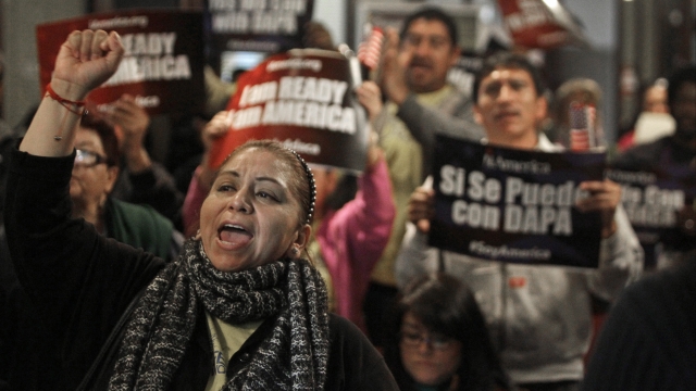Mercedes Herrera and others chant during an event on DACA in 2015.