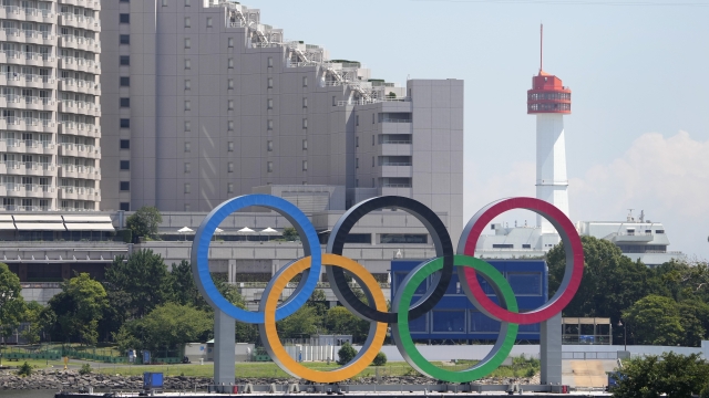 The Olympic rings float on a barge ahead of the 2020 Summer Olympics.