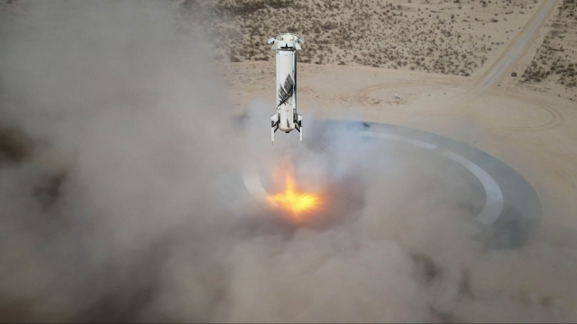 The New Shepard NS-14 booster rocket lands at Launch Site One in West Texas.