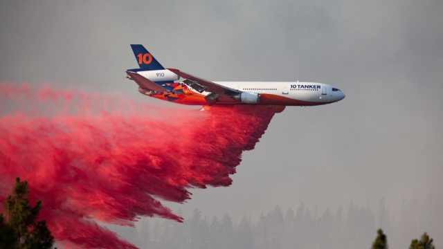 A DC-10 tanker drops retardant over the Bootleg Fire in southern Oregon.