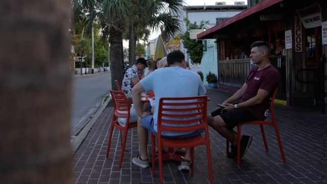 Customers sit outside