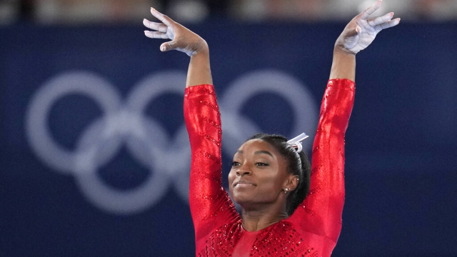 Simone Biles, of the United States, performs on the vault