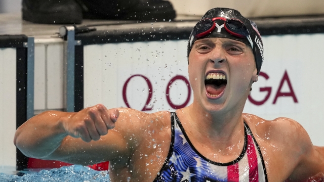Katie Ledecky, of the United States, reacts after winning the women's 1500-meters freestyle