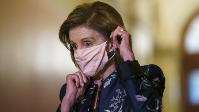 Speaker of the House Nancy Pelosi, D-Calif., wears a face mask.