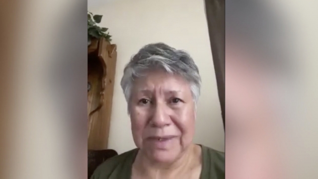 Woman speaks via video chat