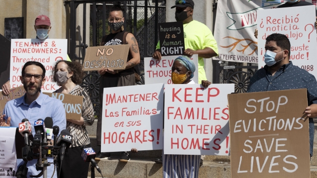 People from a coalition of housing justice groups protesting evictions.