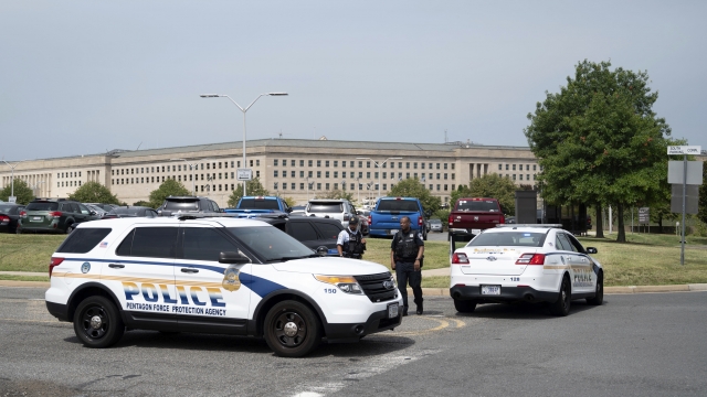 Police block off an entrance to the Pentagon following reports of multiple gunshots.