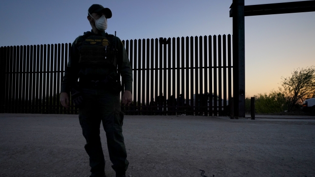 A U.S. Customs and Border Protection agent near the U.S.-Mexico border wall in Texas.