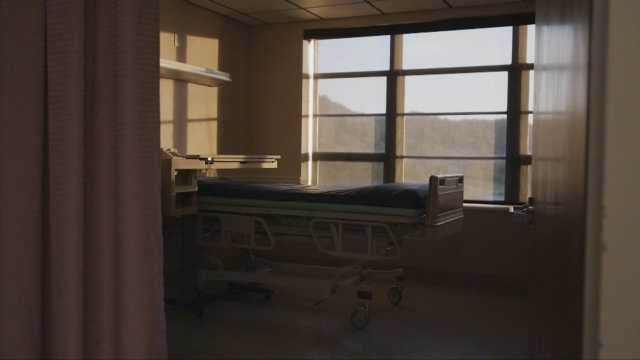 Empty hospital bed.
