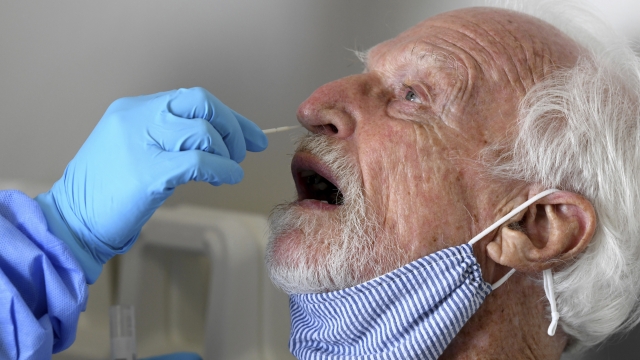 A man get's a COVID-19 nose swab test.