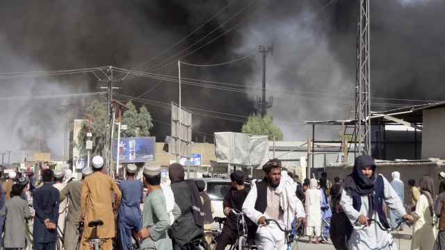 Smoke rises after fighting between the Taliban and Afghan security personnel in the city of Kandahar,