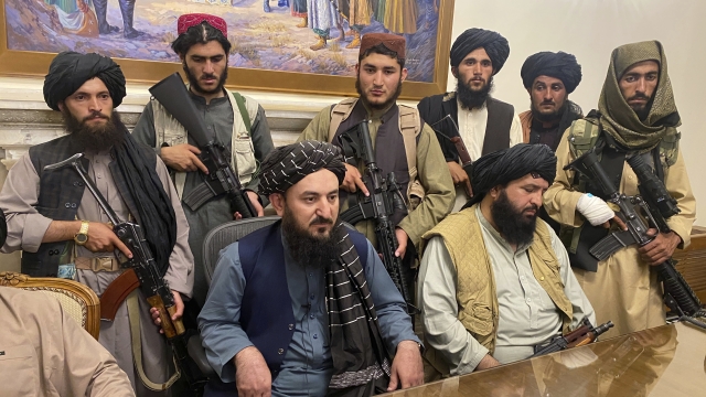 Taliban fighters take control of Afghan presidential palace.