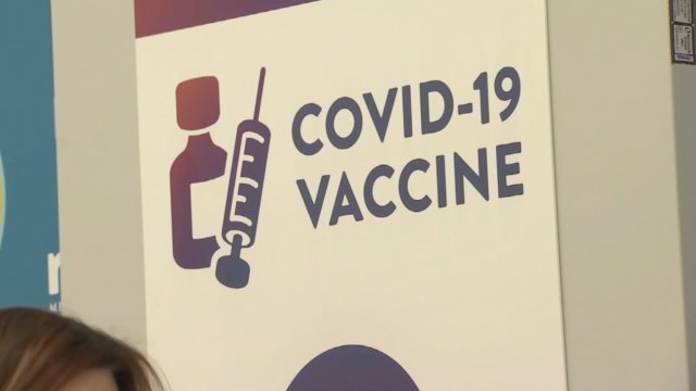 A COVID-19 vaccine sign.