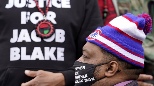 Jacob Blake Jr. listens to a speech during a Get Out The Vote rally in Chicago