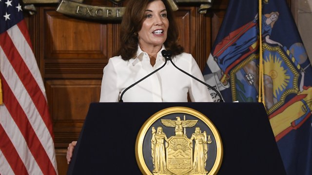 New York Gov. Kathy Hochul speaks to reporters after a ceremonial swearing-in ceremony at the state Capitol, Tuesday, Aug. 24