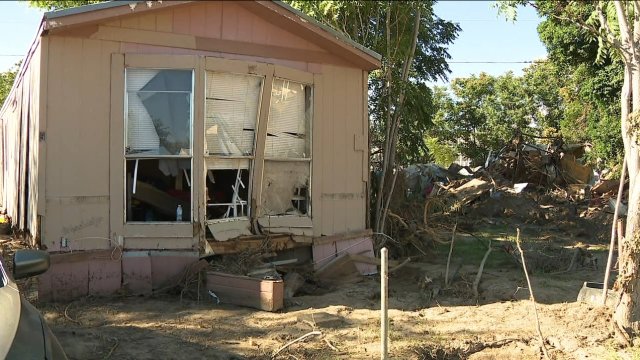 Home damaged by flood waters.