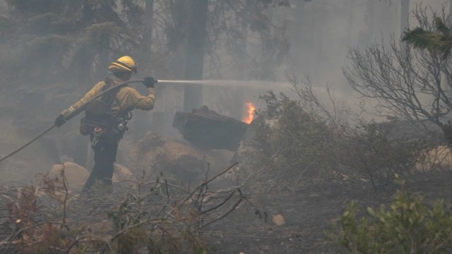 Firefighters battle the Caldor Fire one small blaze at a time.