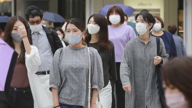 People wearing face masks in Tokyo, Japan.