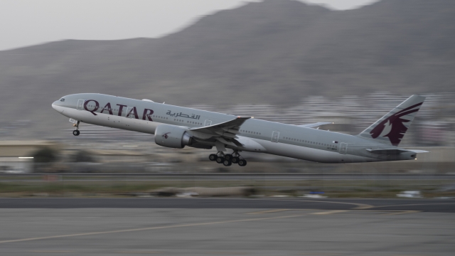 A Qatar Airways passenger plane takes off with foreigners from the airport in Kabul, Afghanistan.
