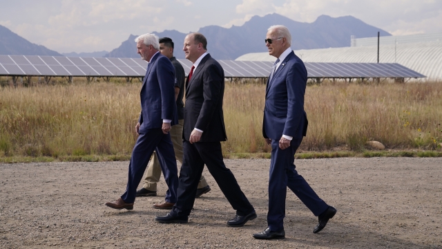 President Joe Biden walks to speak about infrastructure at the Flatirons campus of the National Renewable Energy Laboratory.
