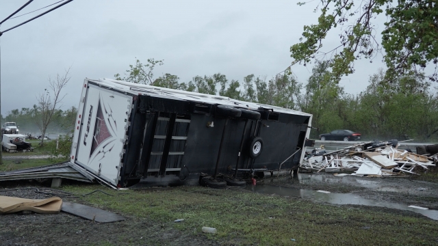 A trailer lies on its side after Hurricane Ida
