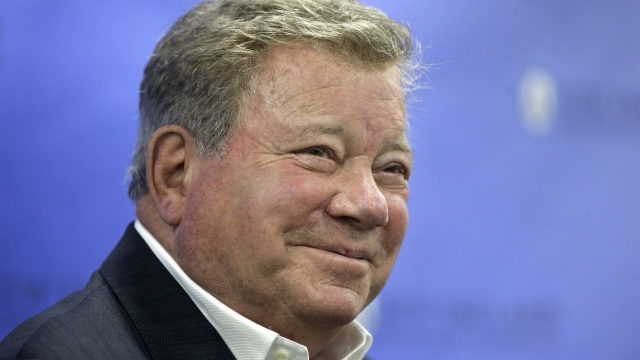 Actor William Shatner takes questions from reporters.
