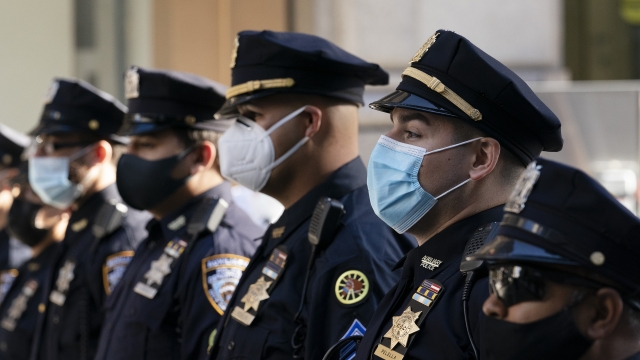 New York Police Department officers in masks