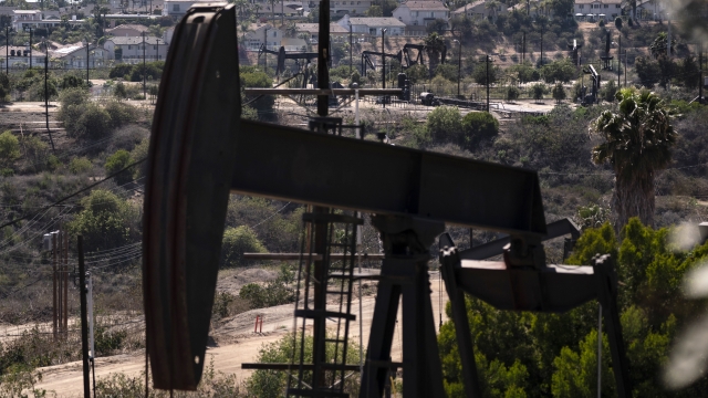 Pump jacks operating at the Inglewood Oil Field in Los Angeles, California.