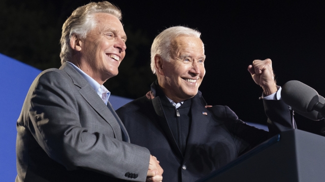 President Joe Biden, right, and former Virginia Gov. Terry McAuliffe, left