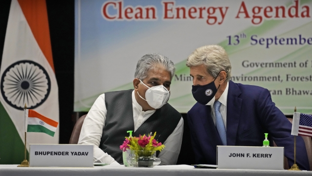 Indian Environment Minister Bhupender Yadav and U.S. climate envoy John Kerry
