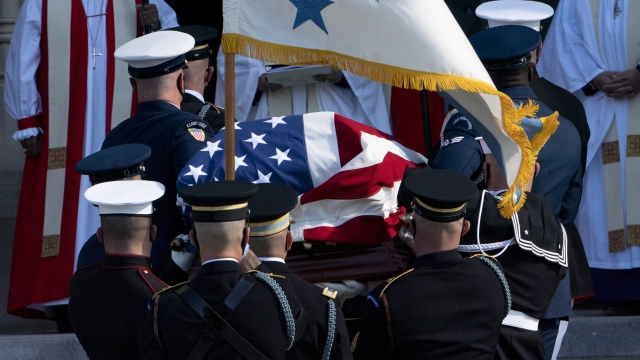 Flag-draped casket of former Secretary of State Colin Powell.