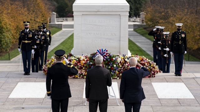 President Joe Biden salutes the Tomb of the Unknown Soldier.