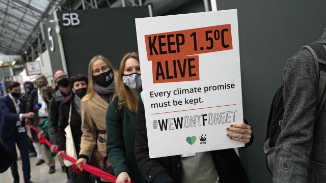 Climate activists hold a demonstration through the venue of the COP26 U.N. Climate Summit