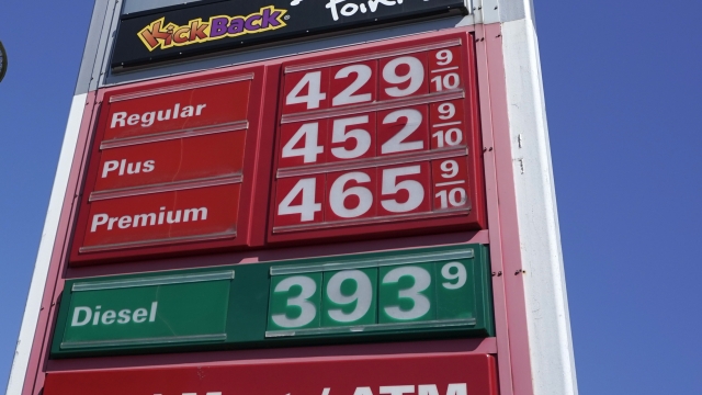 Gas prices displayed at a station.