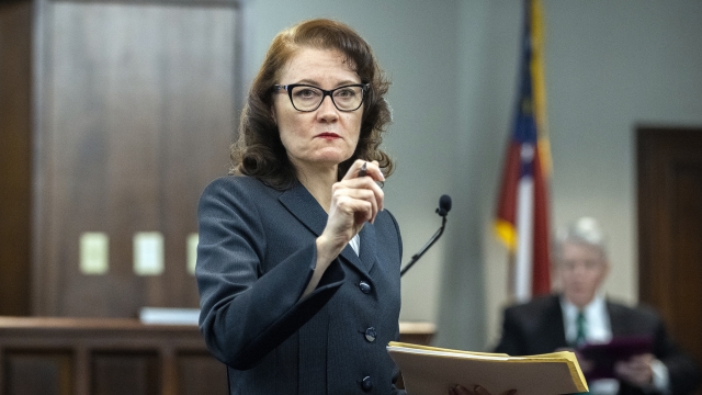 Prosecutor Linda Dunikoski asks for evidence to be brought into the courtroom during Dr. Edmund R. Donoghue's testimony.