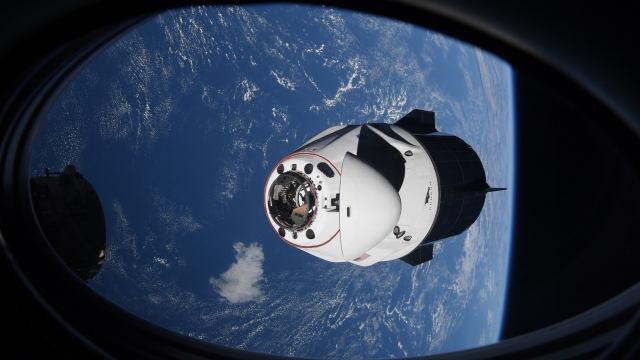 The SpaceX Crew Dragon capsule approaches the International Space Station for docking