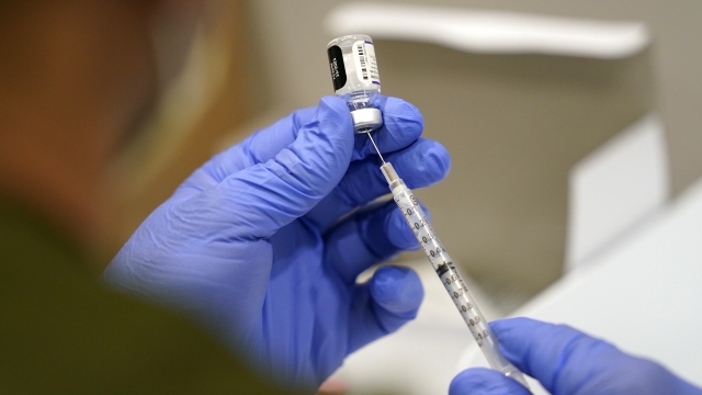 Syringe with COVID-19 vaccine.