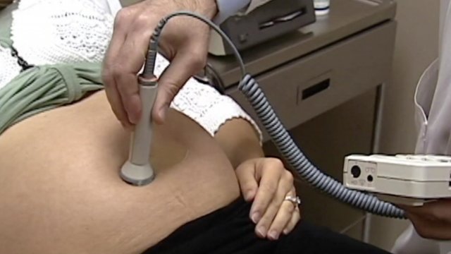 Person undergoing ultrasound scan