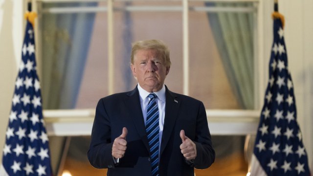 Former President Donald Trump gives thumbs up