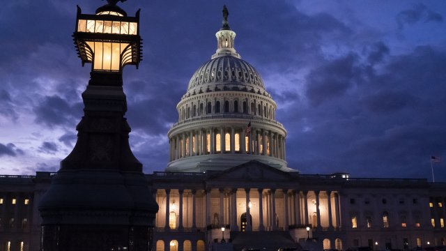 Night falls at the the Capitol in Washington, Thursday, Dec. 2, 2021.